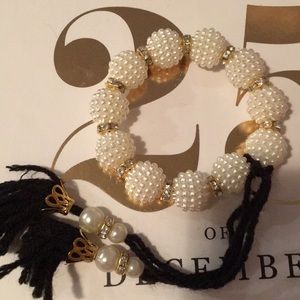 White pearl and diamond tie bracelet with tassels
